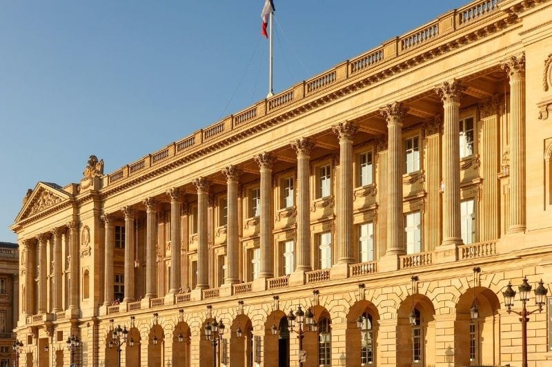 Neoclassical façade of the Hôtel de la Marine on Place de la Concorde at golden hour